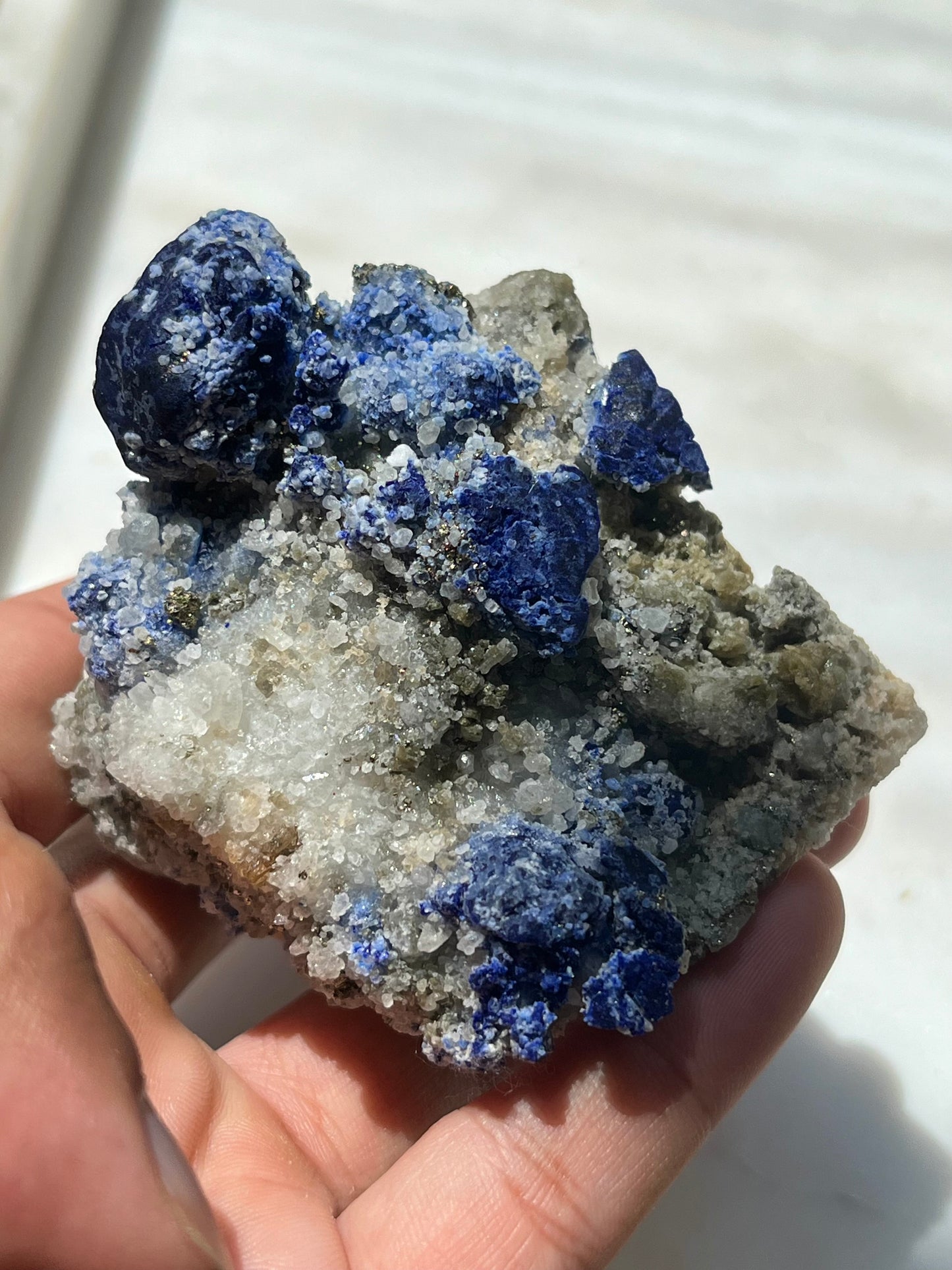 Lazurite specimen on white marble matrix w/ pyrite (Quality 2) - Lot 1