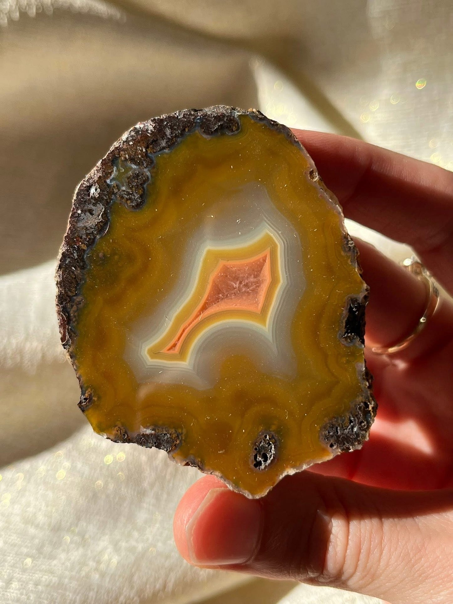 Vibrant Orange Laguna Agate Specimen with Translucent Quartz Window